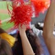 Fans with pom-pom behind plasma - VideoHive Item for Sale