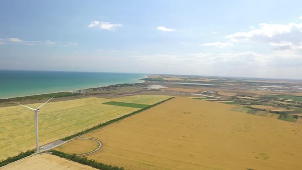 Panorama of Beautiful Landscape with Wind Generators in the Coastal Strip, Aerial Survey