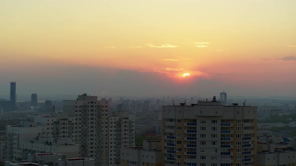 Aerial View of the Bright Orange Sunset Over the City.