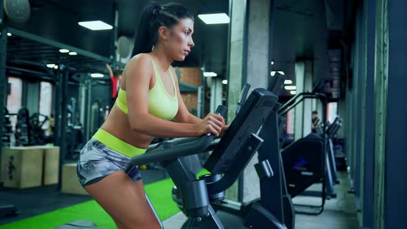 Fitness Woman Doing Cardio in Gym.