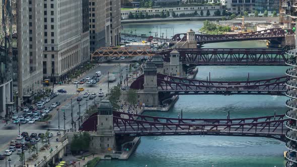 Downtown Chicago River and Bridges with Boats and Traffic Day