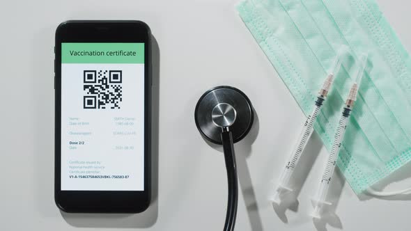 Electronic Vaccination Passport on Phone Closeup Covid 19 Vaccine Qr Code on Smartphone