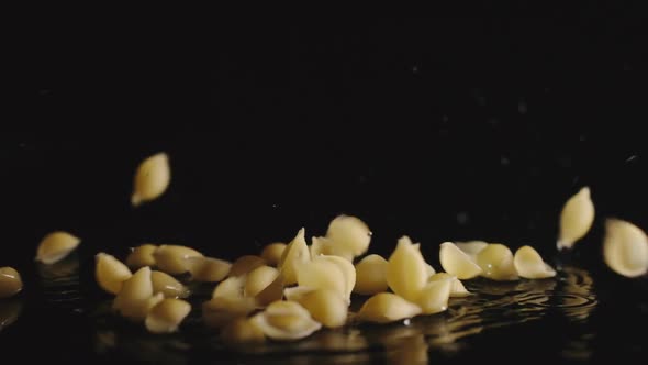 Conchiglie Pasta Fall Into Water