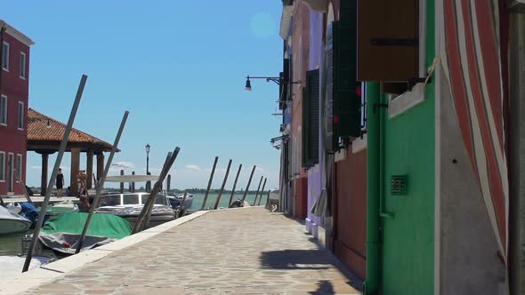 Burano Island Inhabitants Lazily Going to Work on Windy Working Friday's Morning