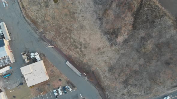 Aerial View of a Highway Running Between in the Distance and a River Below