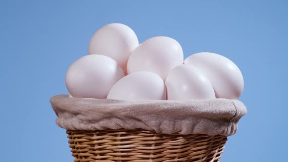 Chicken Eggs in the Basket Rotating Shot Chicken White Fresh Raw Eggs in an Egg Container
