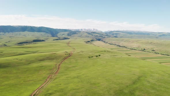 Mountain peaks and grassland