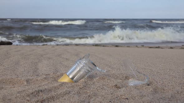 Broken Glass On The Beach