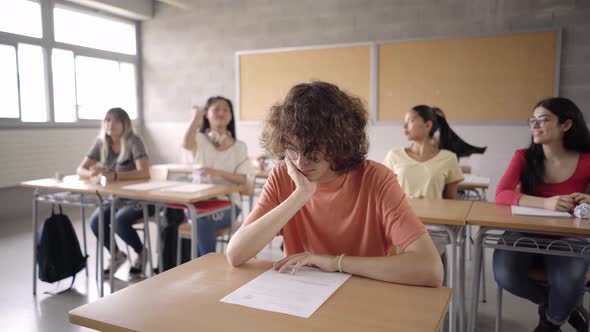 Teenage Schoolboy Bullied By Peers in High School Classroom