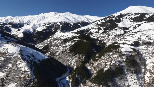 Snowy Winter Landscape of Mountain Villages in the Forest