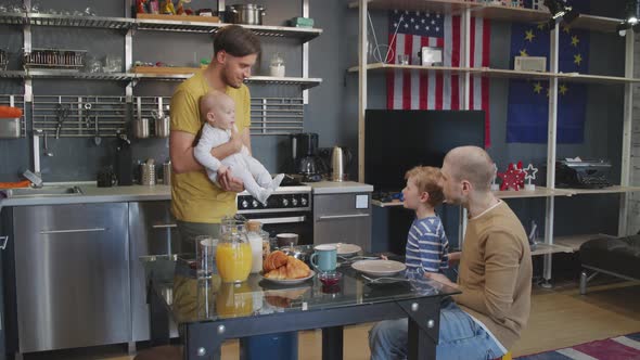 Same-Sex Family with Two Kids in Kitchen