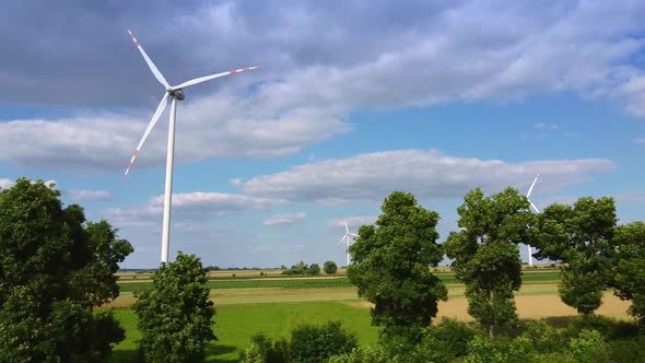 Aerial View of Wind Energy Turbines in Summer