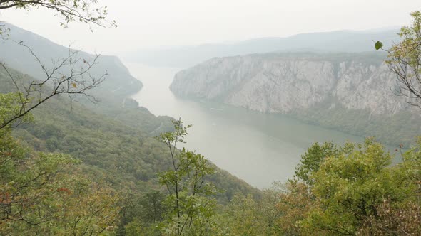 Slow tilt on narrowest point of big river flow 4K 2160p 30fps UltraHD footage - Beautiful Danube gor