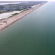 Aerial of Straight Black Sea Seafront with Lonely People, Lakes, and White Sand - VideoHive Item for Sale