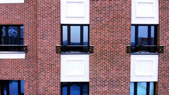 Multi-storey brick building with Windows.