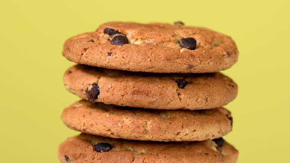 Pile of Oat Cookies with Chocolate Pieces Rotating Close-Up