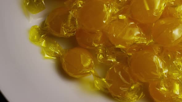 Rotating shot of butterscotch candies 