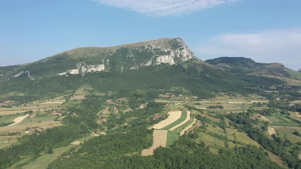 Lateral flight above valley of Stol mountain 4K aerial video