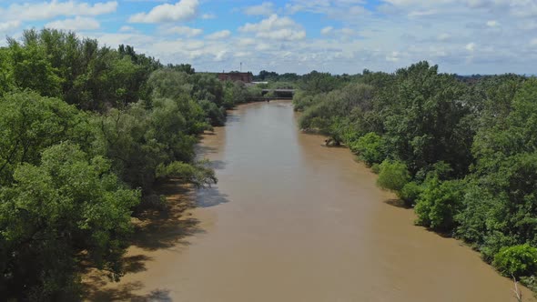 Aerial View Flooded Forest Plains with Country Road