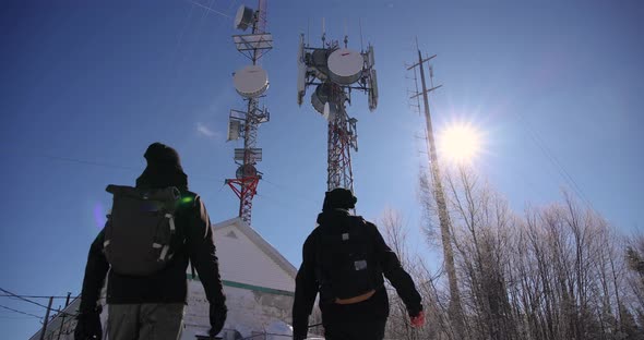 Documentarian Walk Toward Cellular Towers