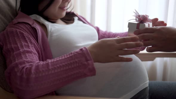 Pregnant Couple Feels Love and Relax at Home