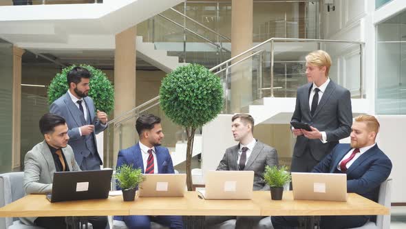 Foreign Business People Shaking Hands Finish Up Meeting