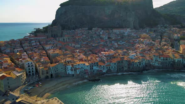 Sandy Beach and Blue Sea in Cefalu Town in Italian Metropolitan City of Palermo Located on