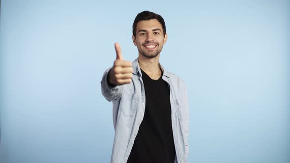 Happy Man Shows Thumb Up Joyful Man Smiling to the Camera