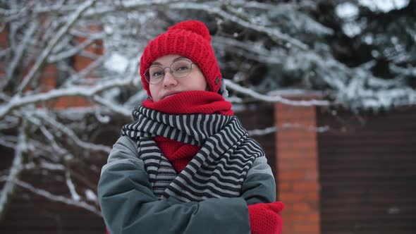 Portrait of a young woman on a winter day outdoors