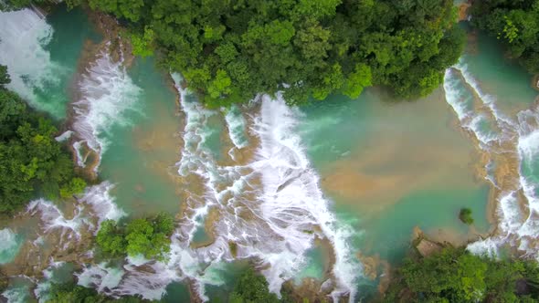 Aerial footage viewing the Agua Azul Waterfalls from above