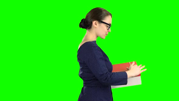 Woman Received a Gift and Is Glad. Green Screen. Side View