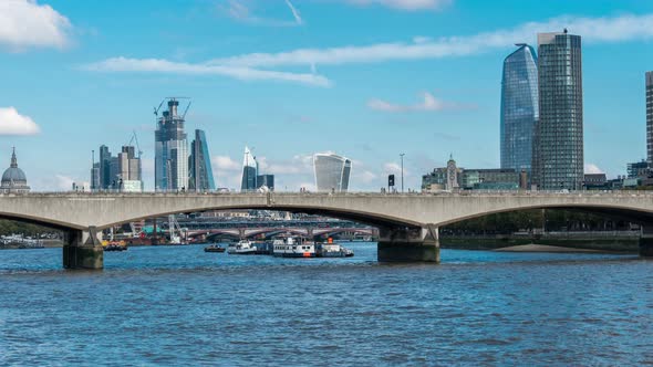 Skyscrapers of The City of London Car Traffic on Waterloo Bridge London UK