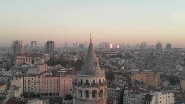 Dolly zoom in Galata Tower aerial view at sunrise. vertigo effect in Galata Tower.