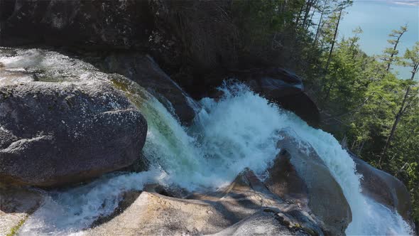 Flowing Water Around the Rocks on Top of Shannon Falls