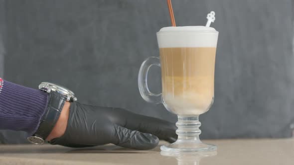 Barista Makes Coffee on a Coffee Machine