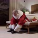 Santa Claus getting dressed for Christmas night. Putting on your clothes. Cinematic 4K. - VideoHive Item for Sale