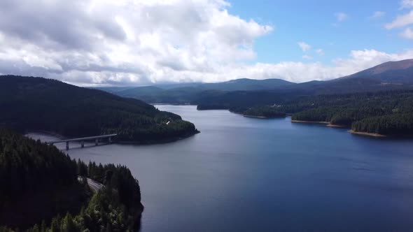 Aerial Pan Right Over Oasa Lake In Romania