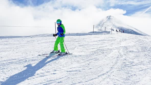 Fast Action Video of a Skiing Boy Going Downhill on Track