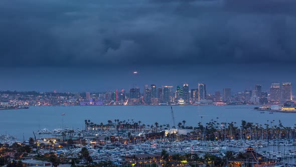 Downtown San Diego Day to Night With Dark Clouds