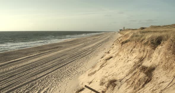 Beach of Sylt with the dunes and the Northsea on a sunny day in 4k 60fps