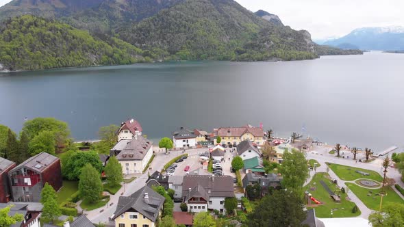 Aerial View of Mountain Lake Wolfgangsee with Houses of Resort Town in Austria, Alps