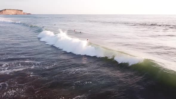 People On Surfboard Paddling And Surfing On Waves In Olon Beach, Ecuador.  - aerial