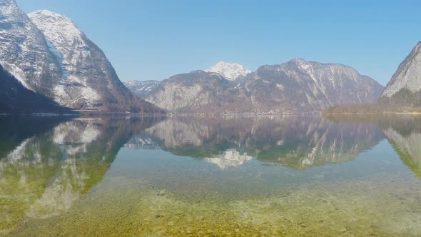 Majestic Snowy Alps Under Blue Cloudless Sky, Clear Lake, Vacation in Mountains