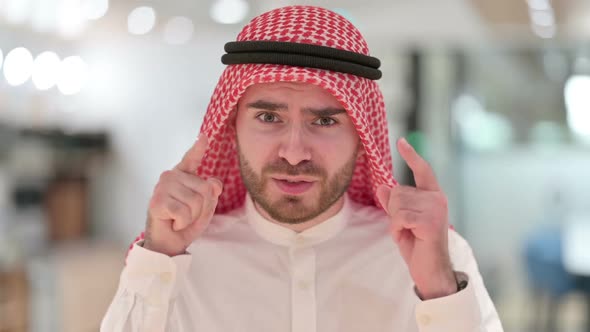 Portrait of Arab Businessman Feeling Shocked Surprised