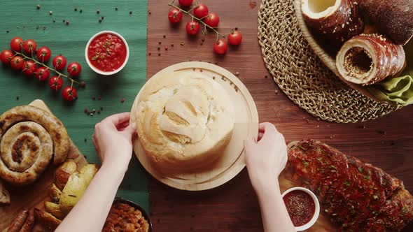 Putting Soup in Bread and Opening Top View