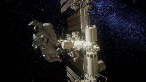 Astronaut Outside the International Space Station on a Spacewalk alt