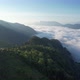 Aerial landscape view of greenery mountains and the sea of fog by drone - VideoHive Item for Sale