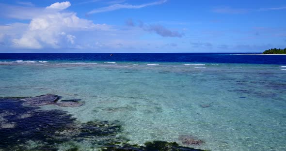 Wide drone abstract view of a summer white paradise sand beach and turquoise sea background in vibra