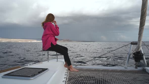 Beautiful White Yacht Breaks the Waves