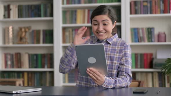 Indian Woman Reacting to Loss on Tablet in Office